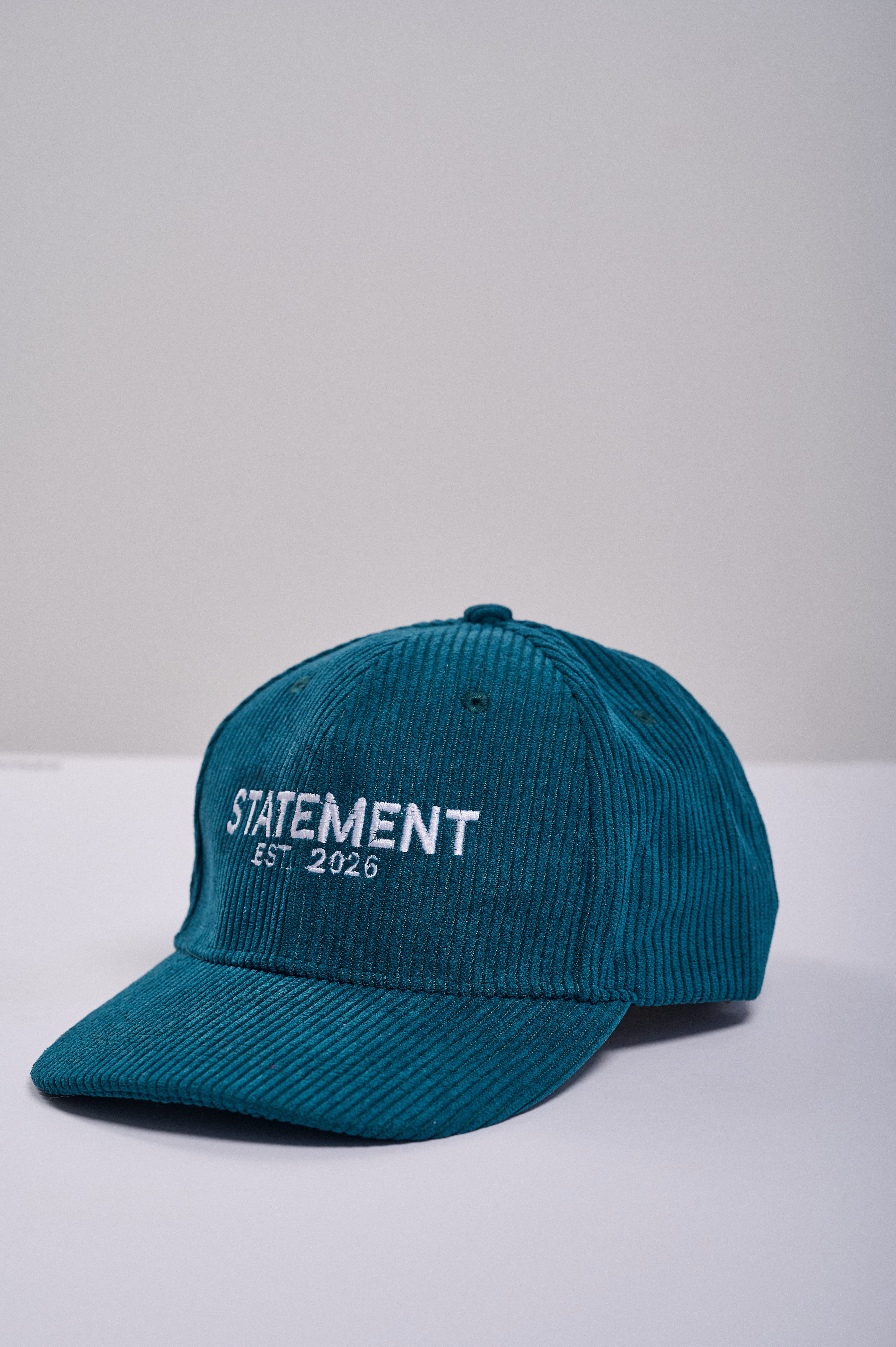 stmnt essential green corduroy cap hover