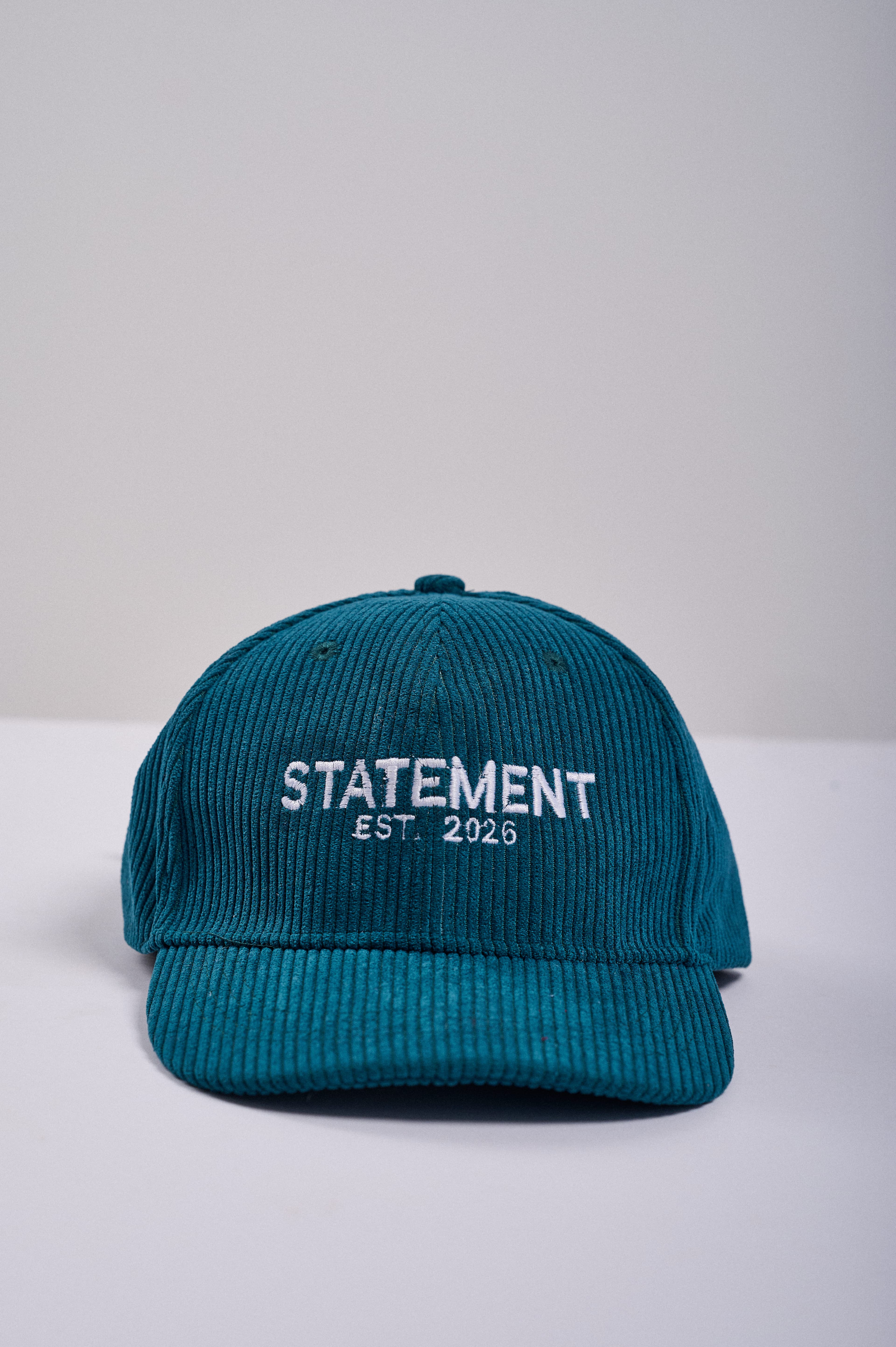 stmnt essential green corduroy cap