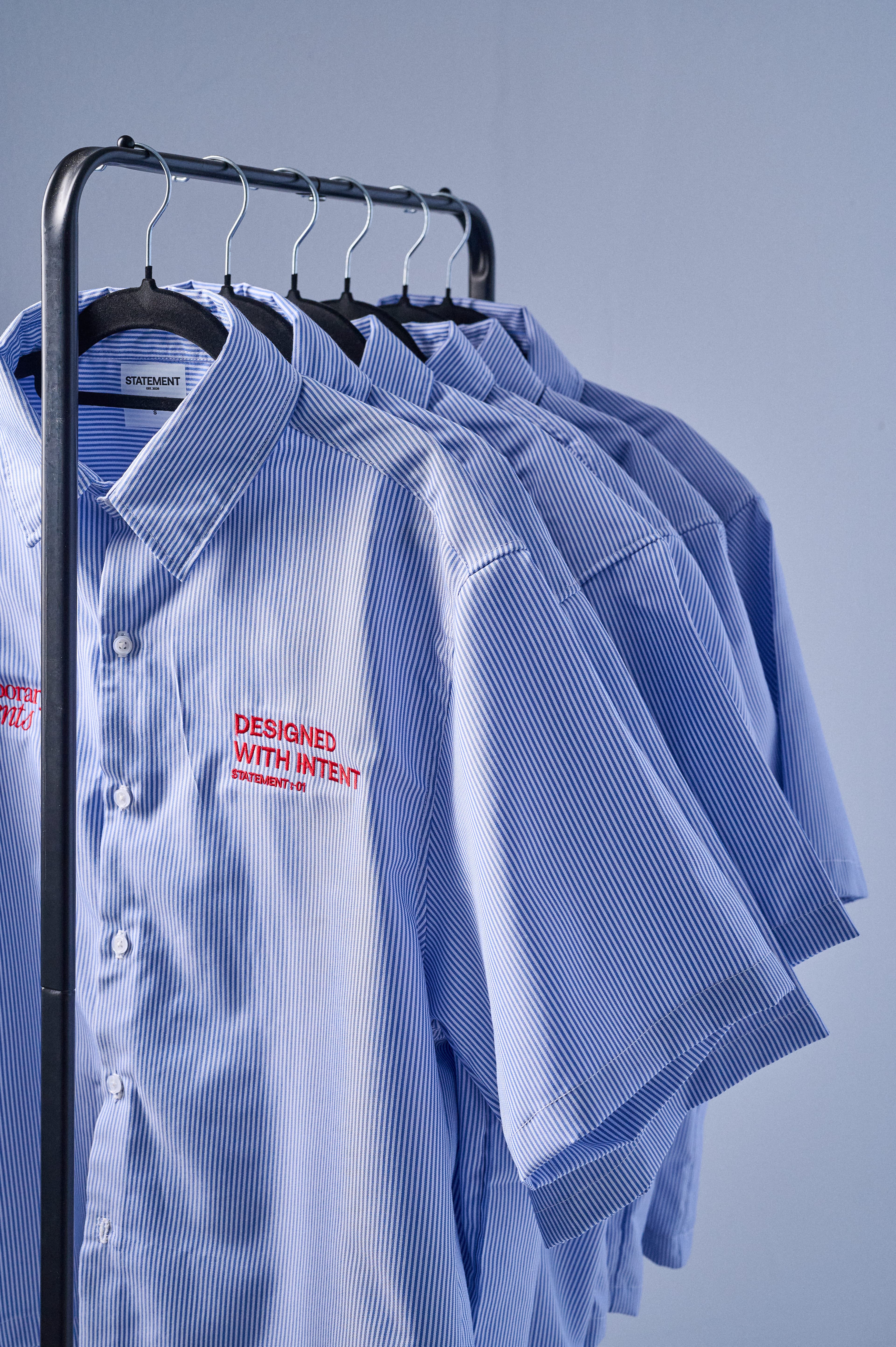 Model wearing STATEMENT shirt